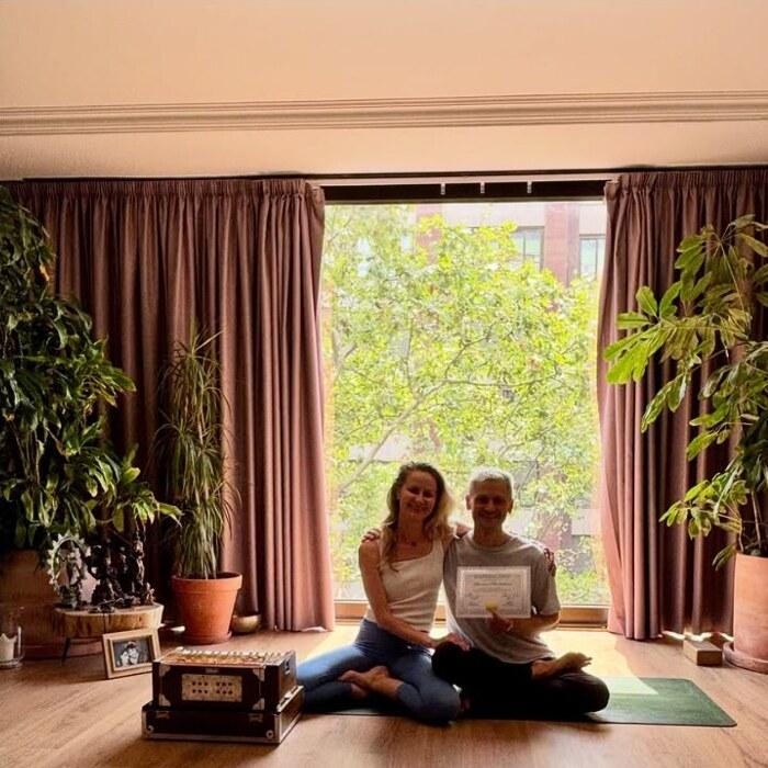 Lennart and his mentor Karina seated together in the Barcelona yoga studio after completing JTAP